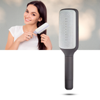 Cepillo de pelo con sistema de autolimpieza